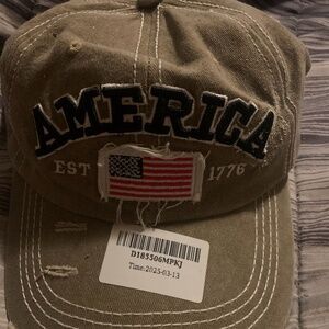 Brand new America hats for men or women.Grey or khaki color
